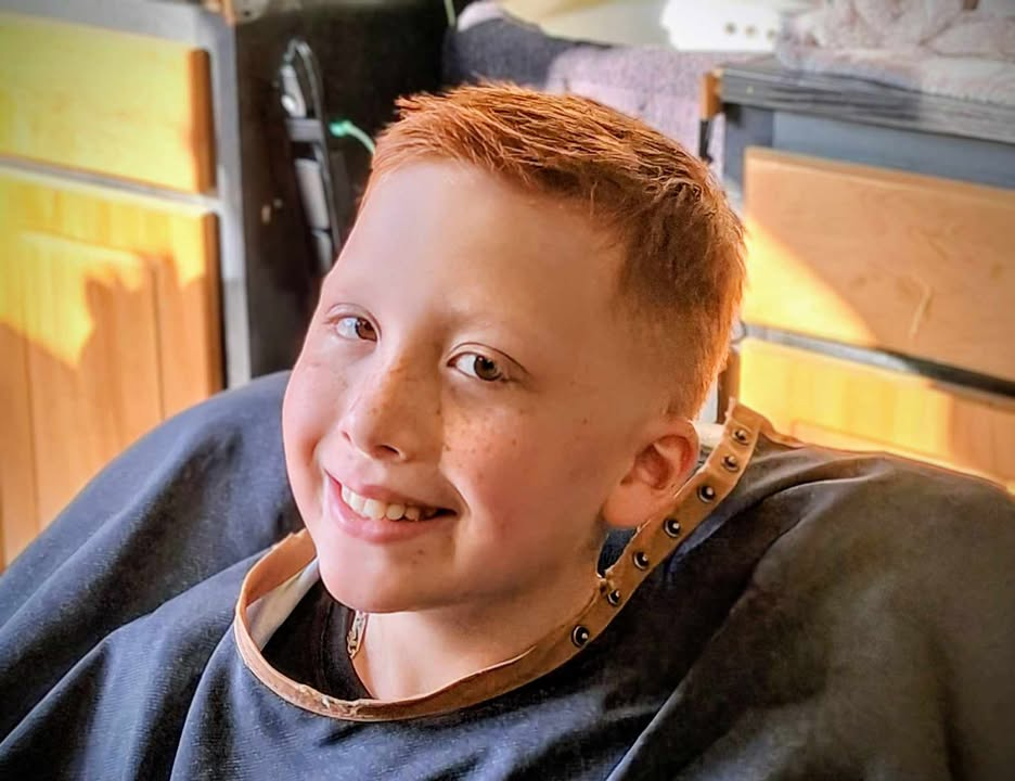 Happy child after kids haircut in Wilson NC